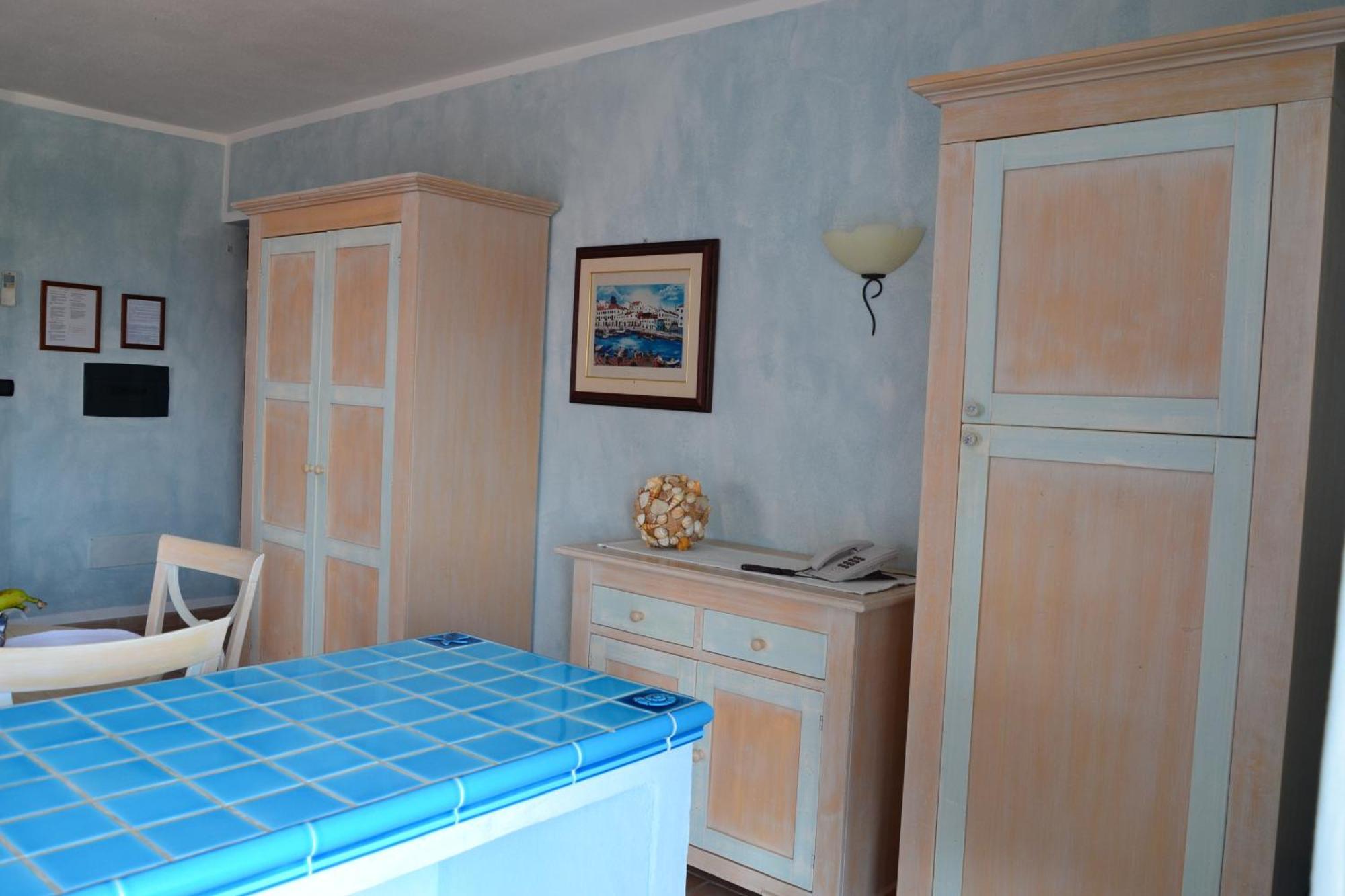 Hotel Villa Del Parco Ла Мадалена Стая снимка